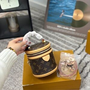 Louis Vuitton Brown and Tan Monogram Cylinder Bag